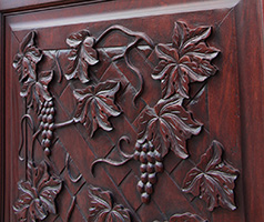 exterior carved door with grapes vines and lattice work all hand carved 