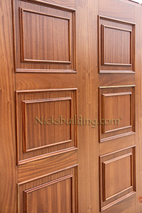 exterior copper doors shaker mahogany panels closeup