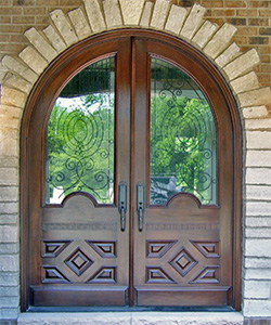 Arched top doors with iron  