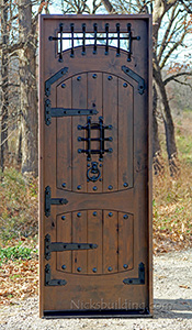 Medevil Exterior Door with glass and iron and nails Fortress doors