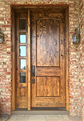 rustic entry door with sidelite